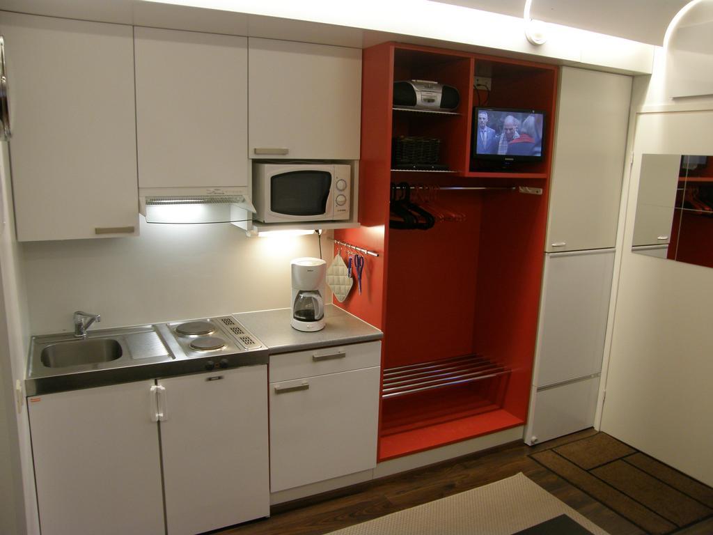 Vuosselin Helmi Apartments Rukatunturi Habitación foto