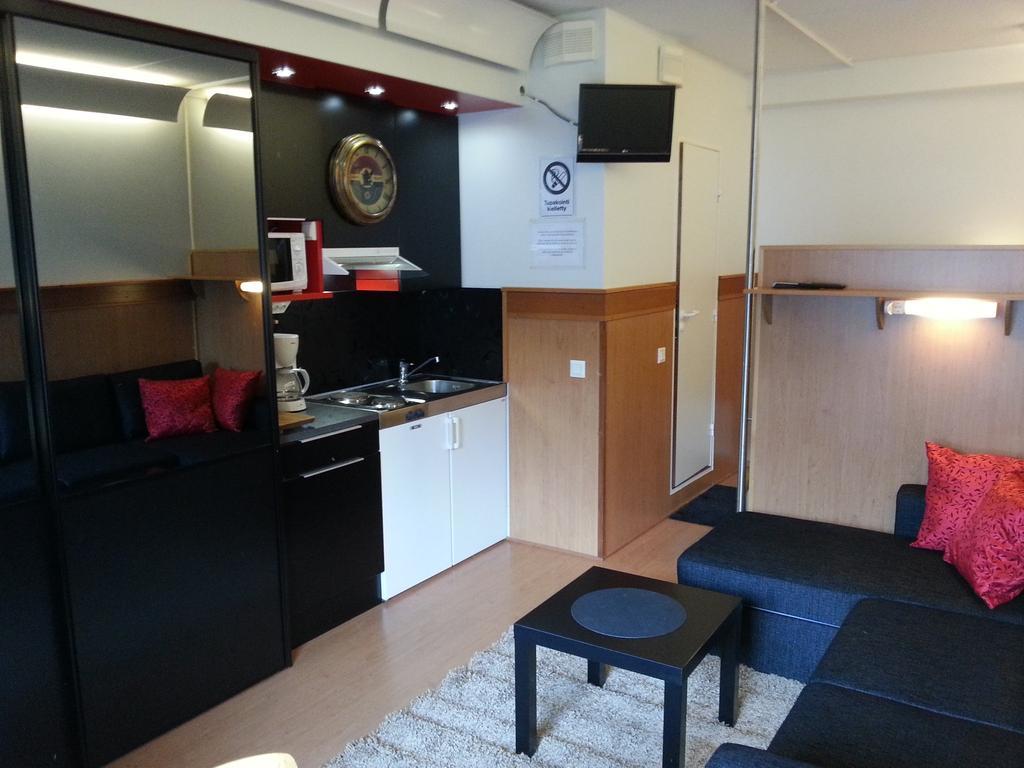 Vuosselin Helmi Apartments Rukatunturi Habitación foto