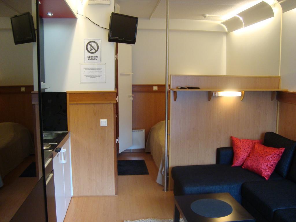 Vuosselin Helmi Apartments Rukatunturi Habitación foto